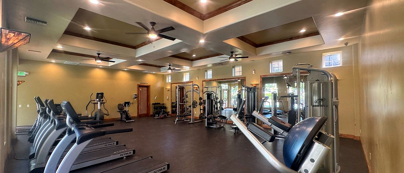Recessed LED lighting in a community fitness room, installed by Current Energy
