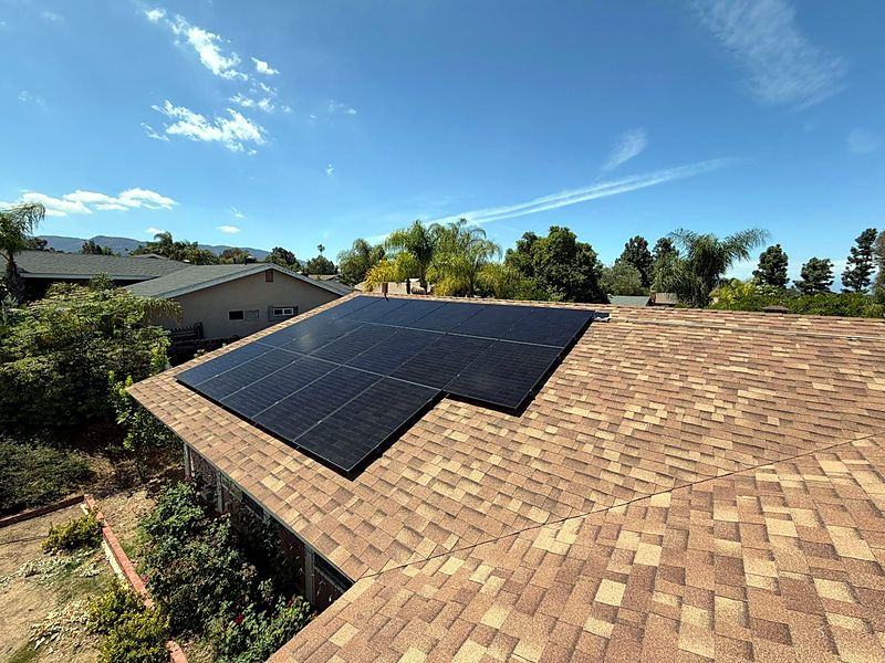 All-black solar modules on a composition shingle roof