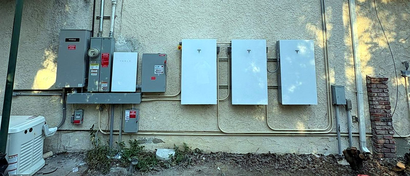 Main electrical panel, meter and battery wall on a home, installed by Current Energy