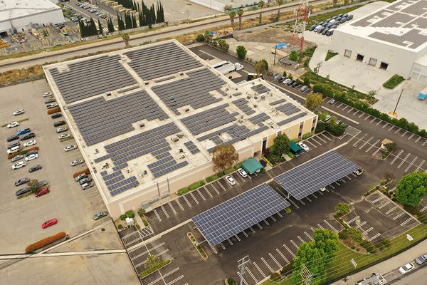 Drone view of the rooftop array and solar carports at the Chatsworth commercial building