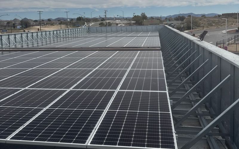 Solar canopy array over a retail parking structure