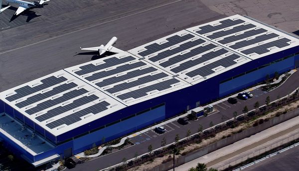 Solar array on a blue hangar roof at Van Nuys Airport