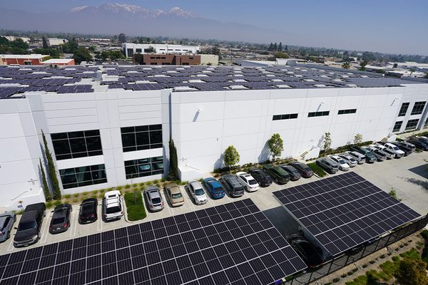Rooftop solar and parking-lot solar canopies at the Vitco Foods distribution center in Ontario